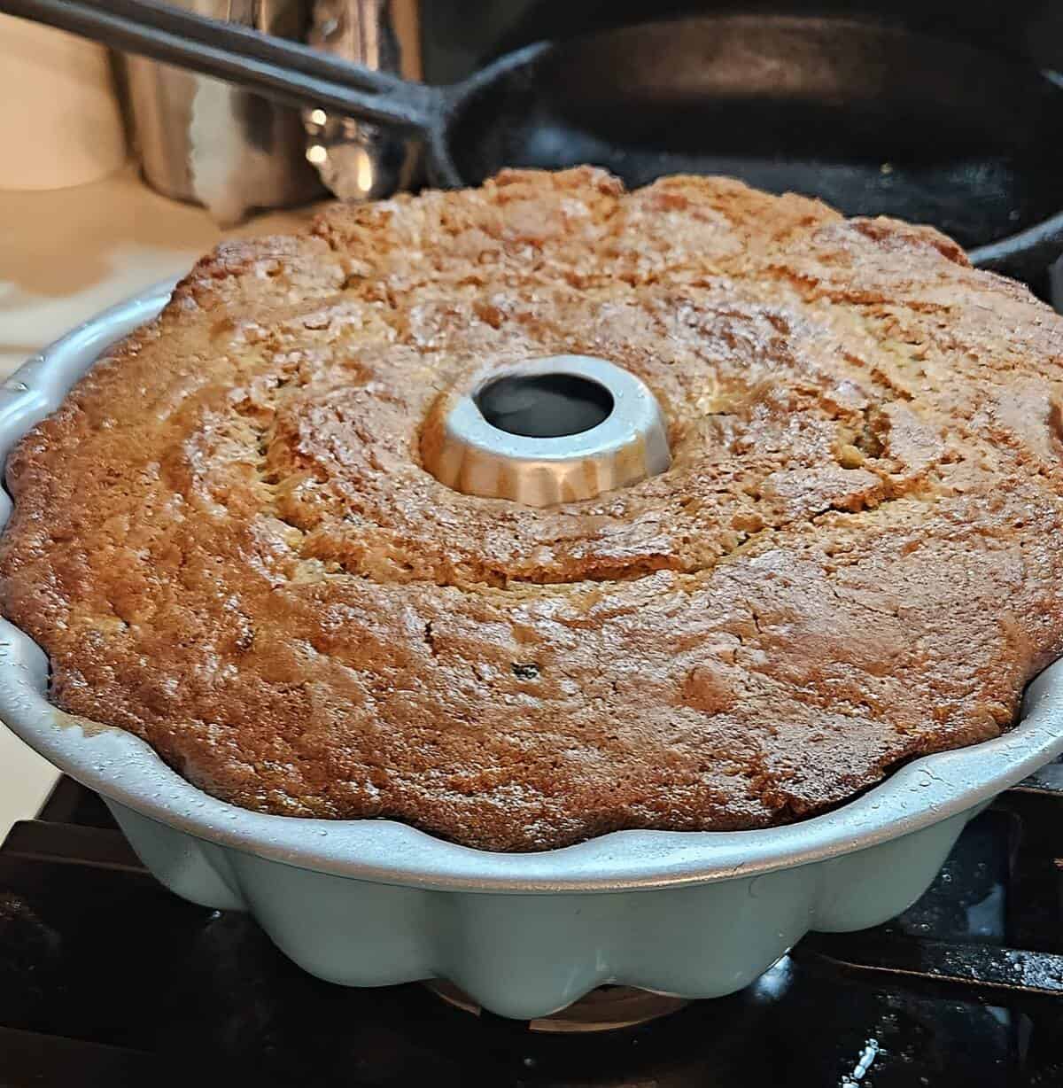 bundt pan with fully baked zucchini bread in it.