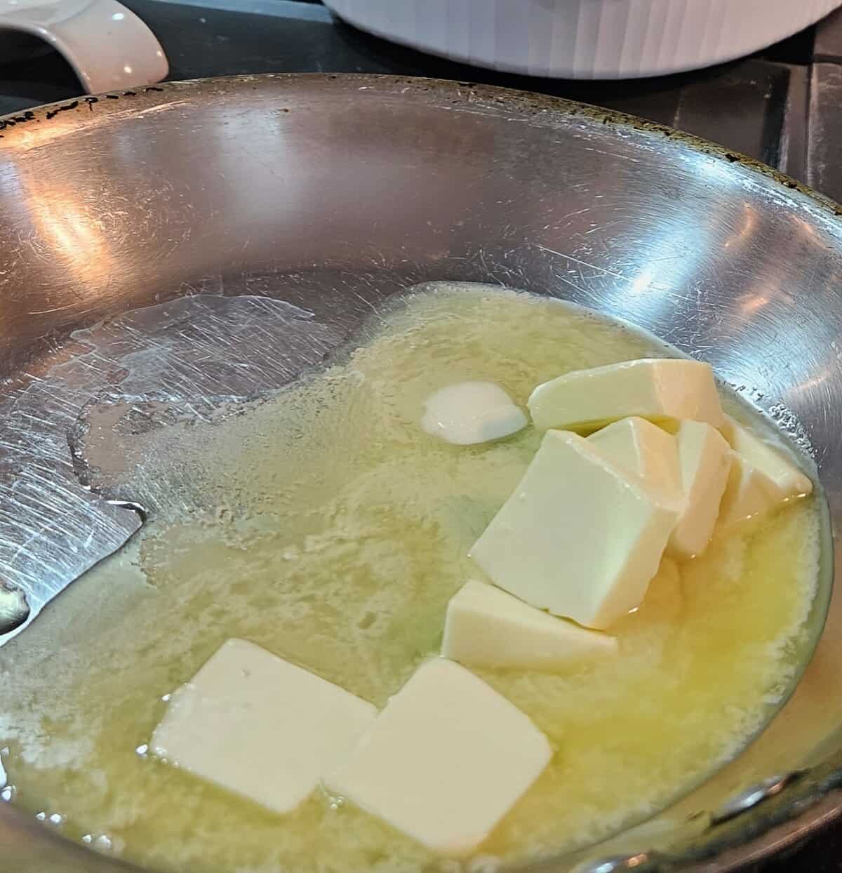butter melting in sauté pan