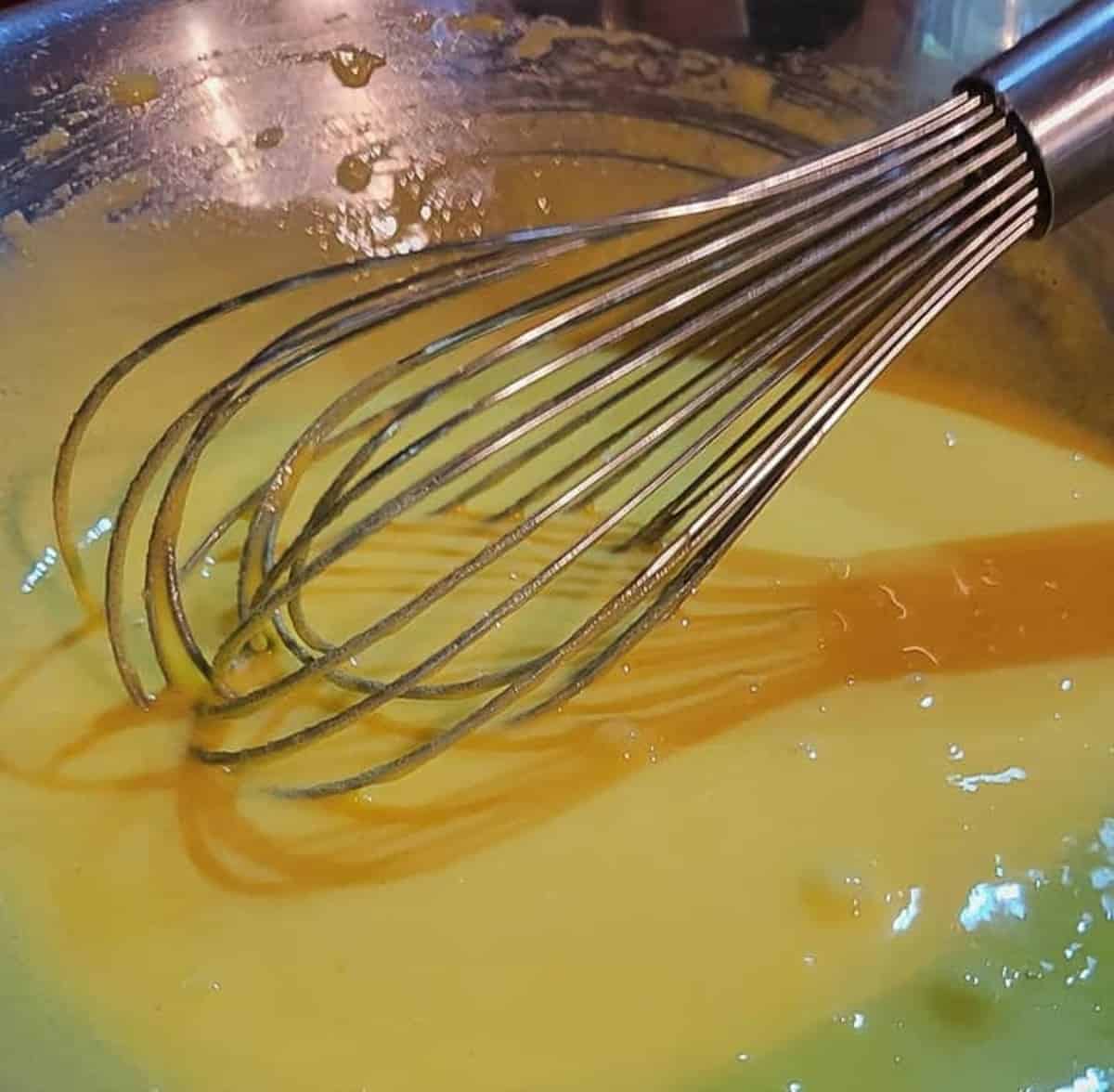 egg yolk and sugar mixture in mixing bowl with wire whip
flourless chocolate torte