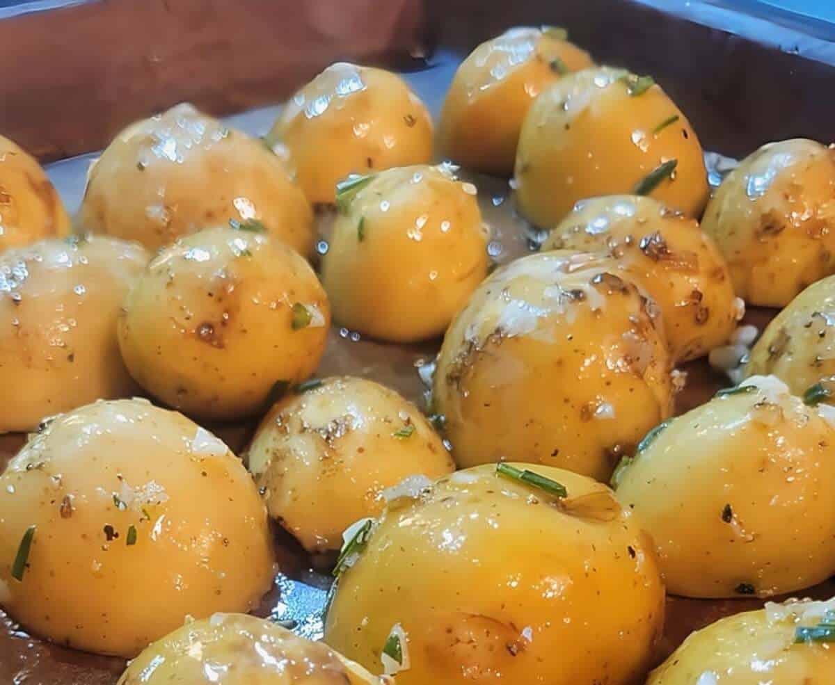 potatoes placed on sheet pan with cut side down