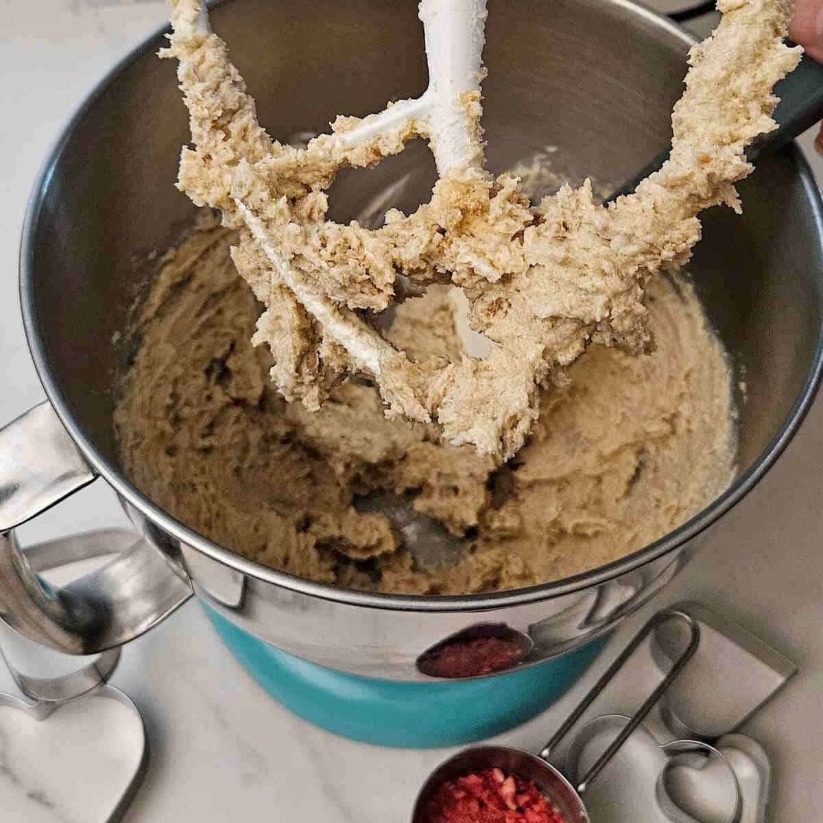 creaming the butter and sugar in the mixer for the best strawberry shortbread sandwich cookie recipe