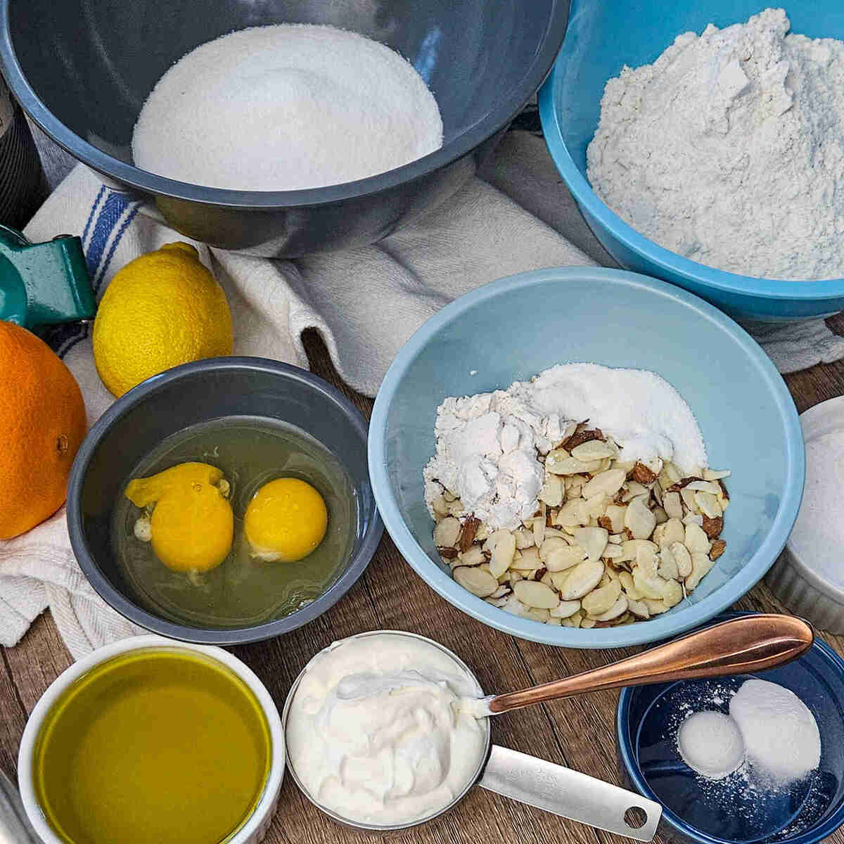 the ingredients for the gluten free olive oil cake