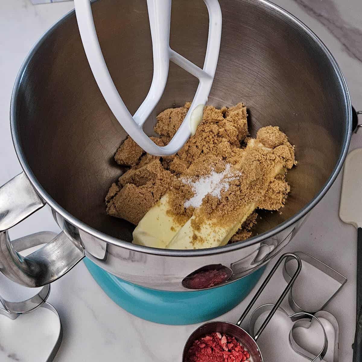butter, brown sugar, white sugar, and salt in the bowl of the mixer for the best strawberry shortbread sandwich cookie recipe