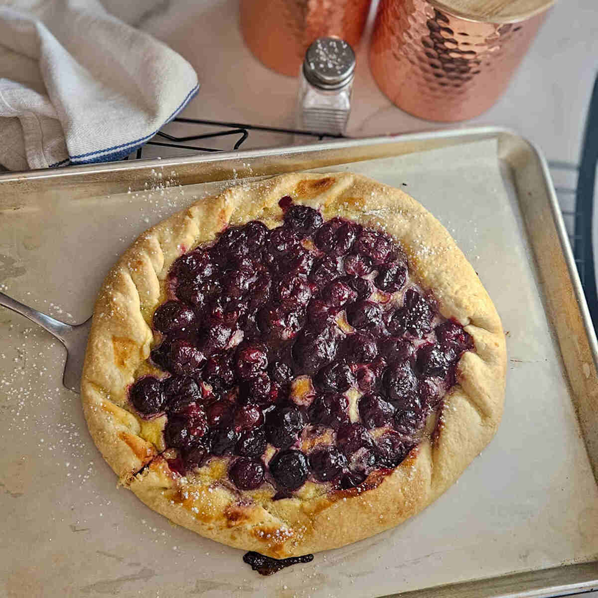 rustic cherry pie on sheet pan