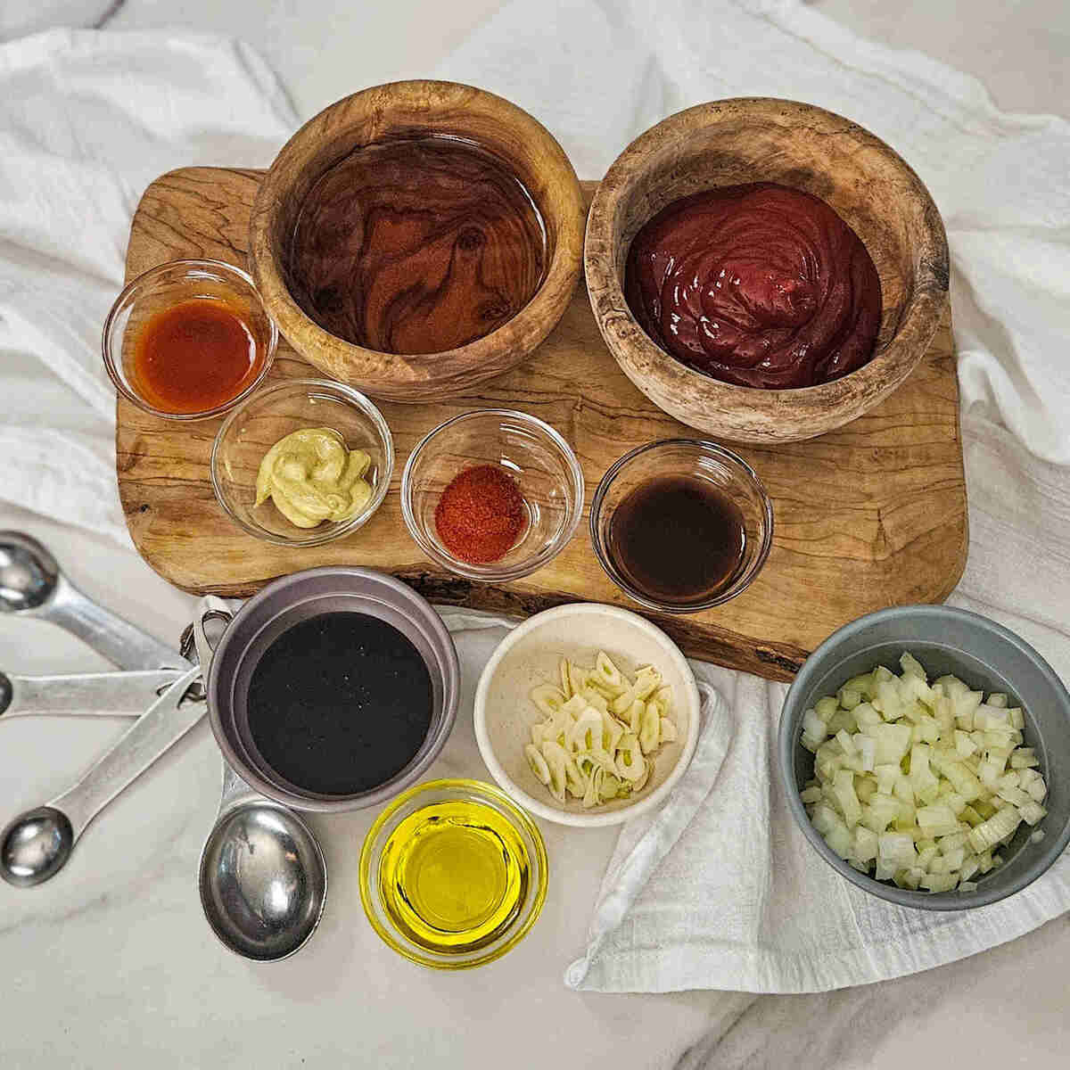 Ingredients for Memphis BBQ sauce on a cutting board.
