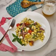 Pasta with prosciutto and tomatoes.