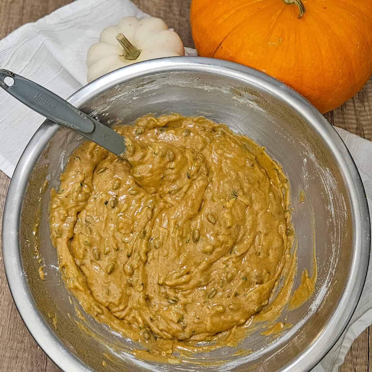 Zucchini pumpkin spice bread batter in a bowl.