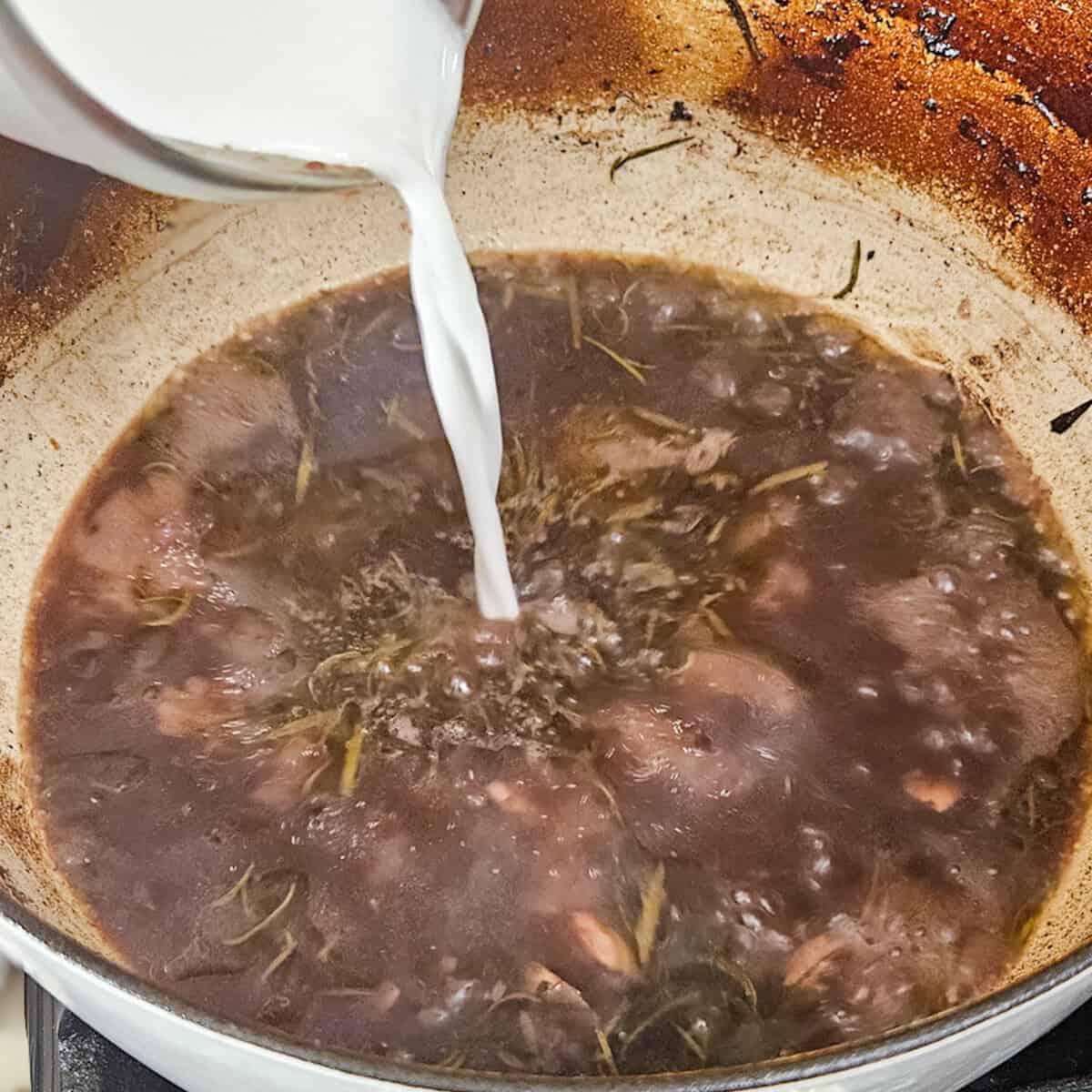 Adding corn starch to the red wine braising liquid.
