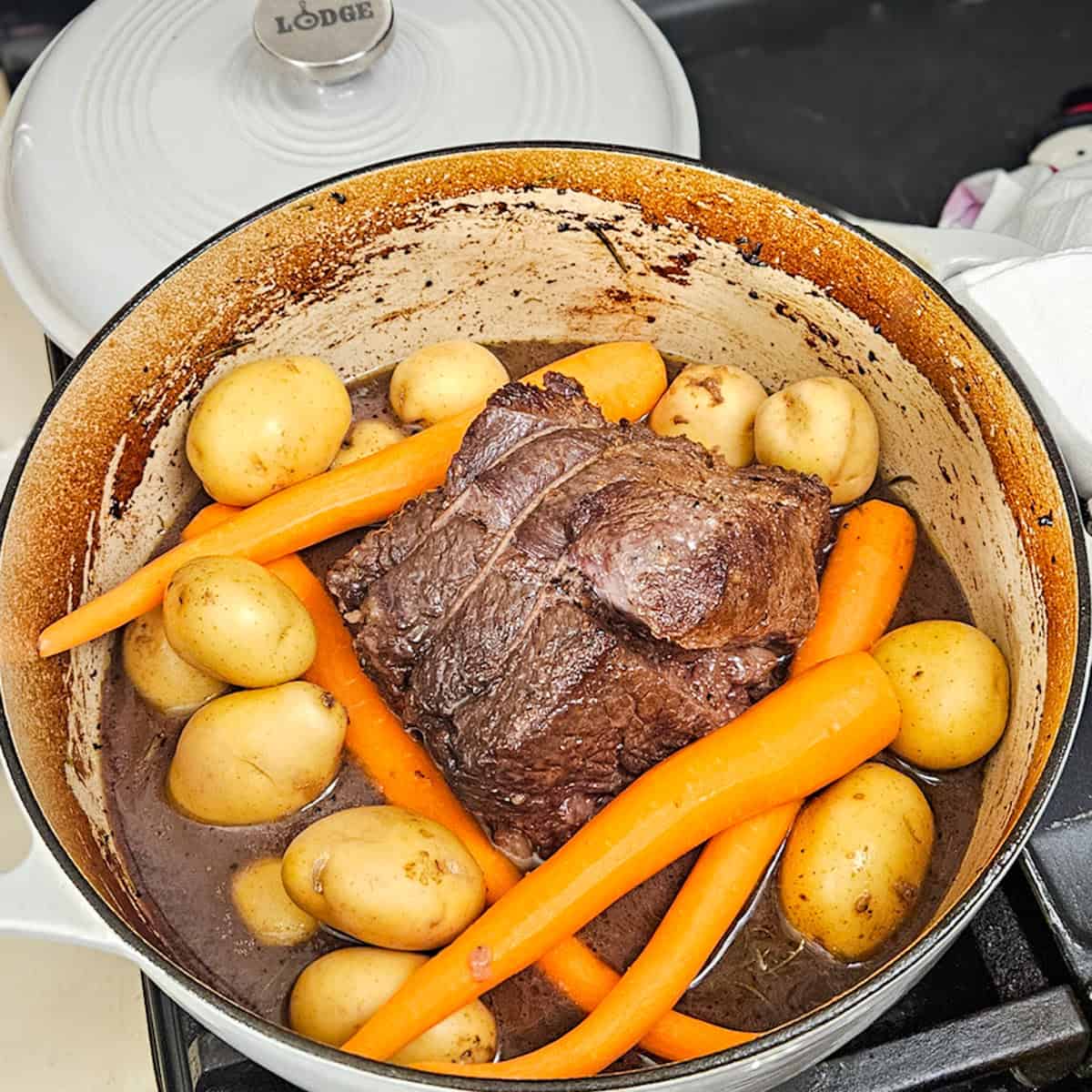 Delicious roast beef with potatoes and carrots, perfect for family dinners and holiday meals.