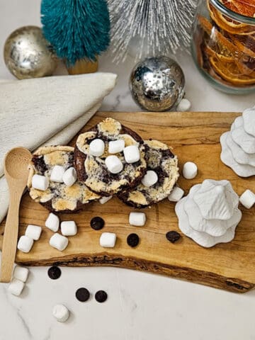 Delicious hot cocoa brownies topped with mini marshmallows, perfect for holiday treats and celebrations.
