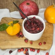 Vibrant cranberry sauce featuring pomegranate,, and tangerine flavors, perfect for seasonal recipes.