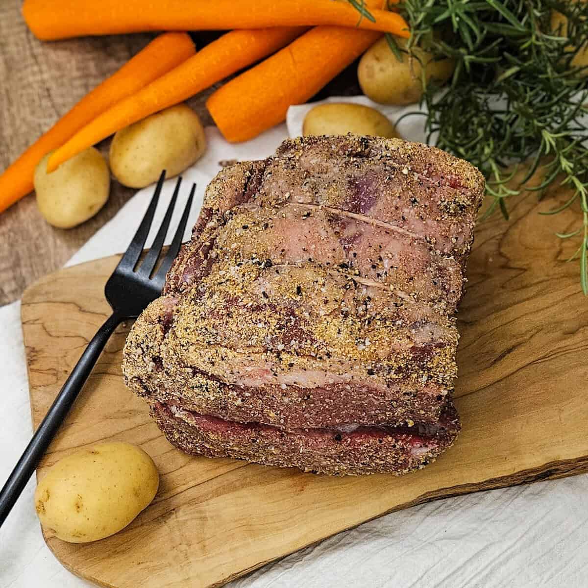 Perfectly seasoned beef roast with spice rub, fresh vegetables, and herbs. Ideal for hearty family meals and special occasions.