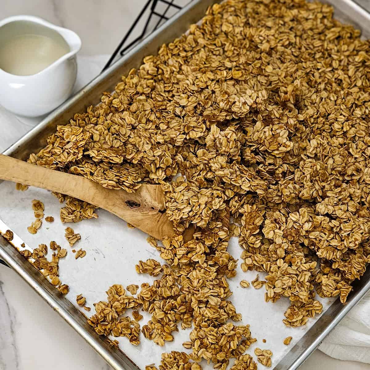 Crunchy homemade granola clusters with oats, chai, and brown sugar.