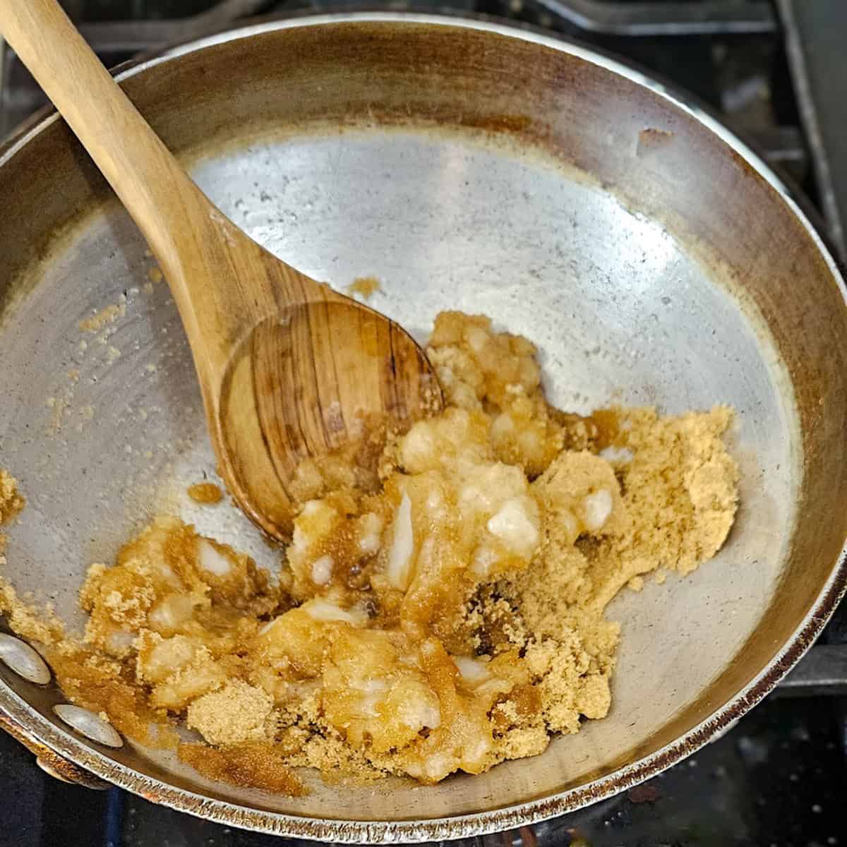 Brown sugar and coconut oil in a pan melting.